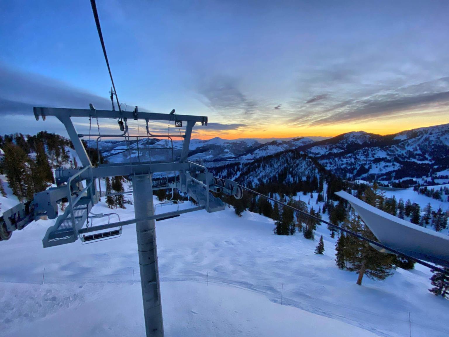An aerial view from the top of a chair lift at sunrise