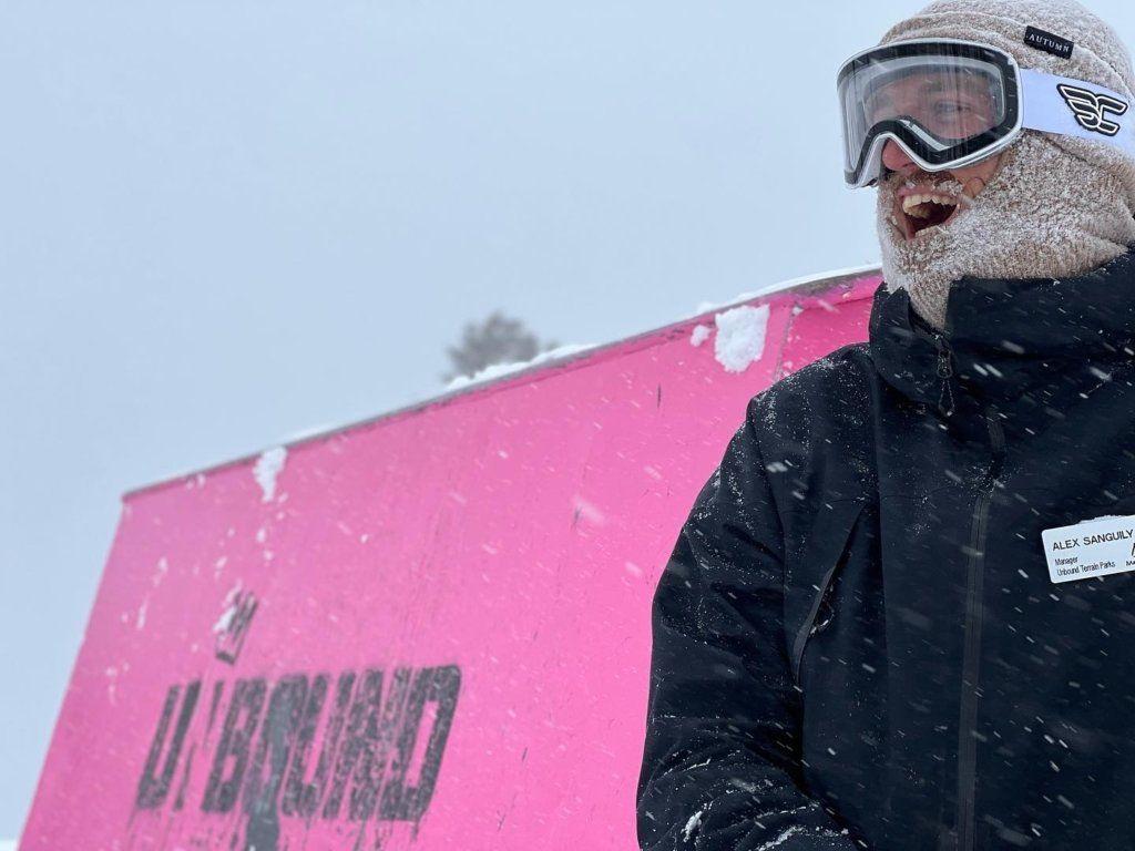 Person wearing winter gear on a snowy day